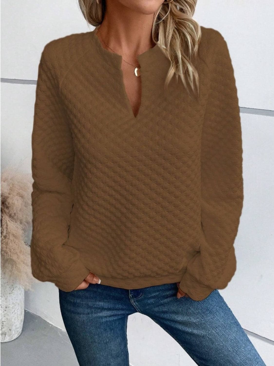 Notched Long Sleeve Sweatshirt.