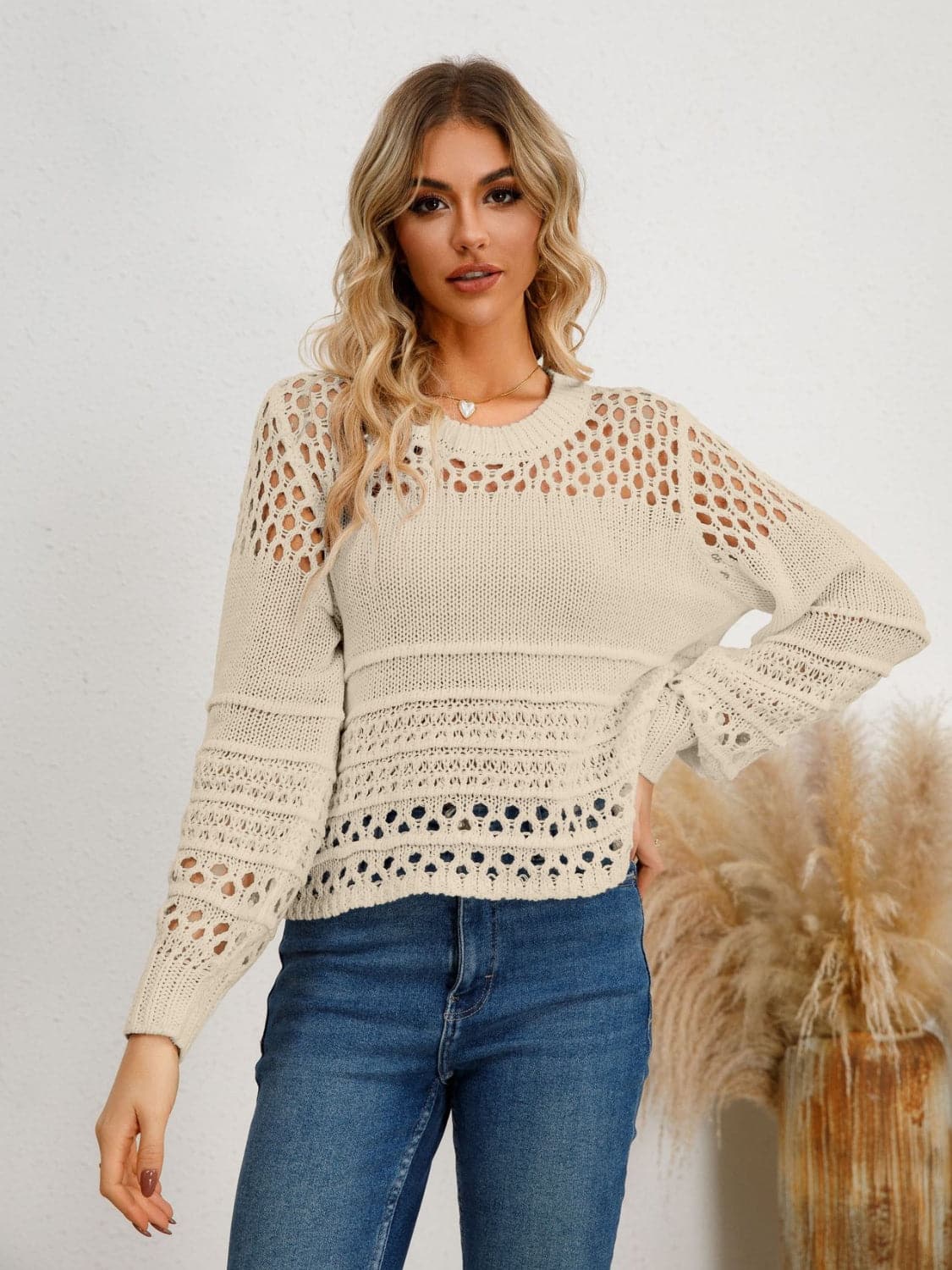 Cutout Round Neck Knit Top.