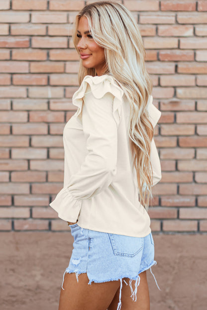 Chic beige corduroy blouse with flounce sleeves