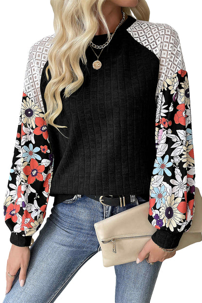 Elegant black floral patchwork ribbed blouse with long sleeves