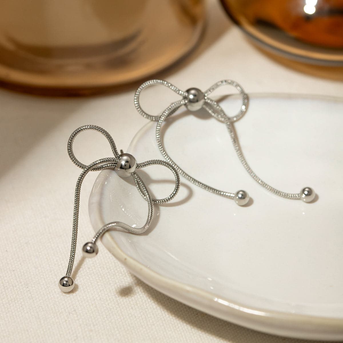 Stainless Steel Bow Earrings.