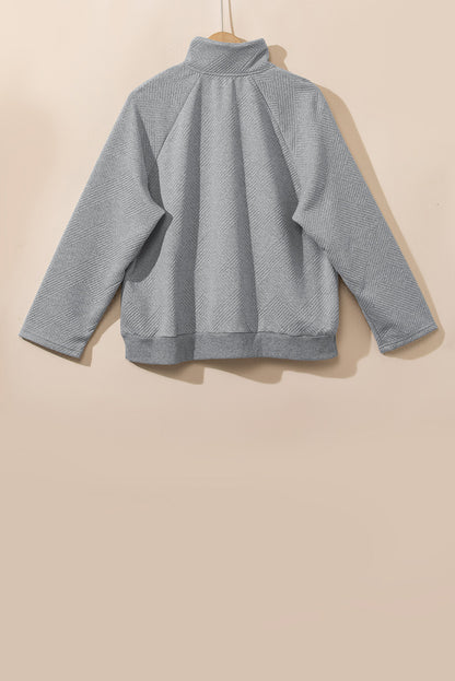 Chic light grey plus size pullover sweatshirt with snap buttons