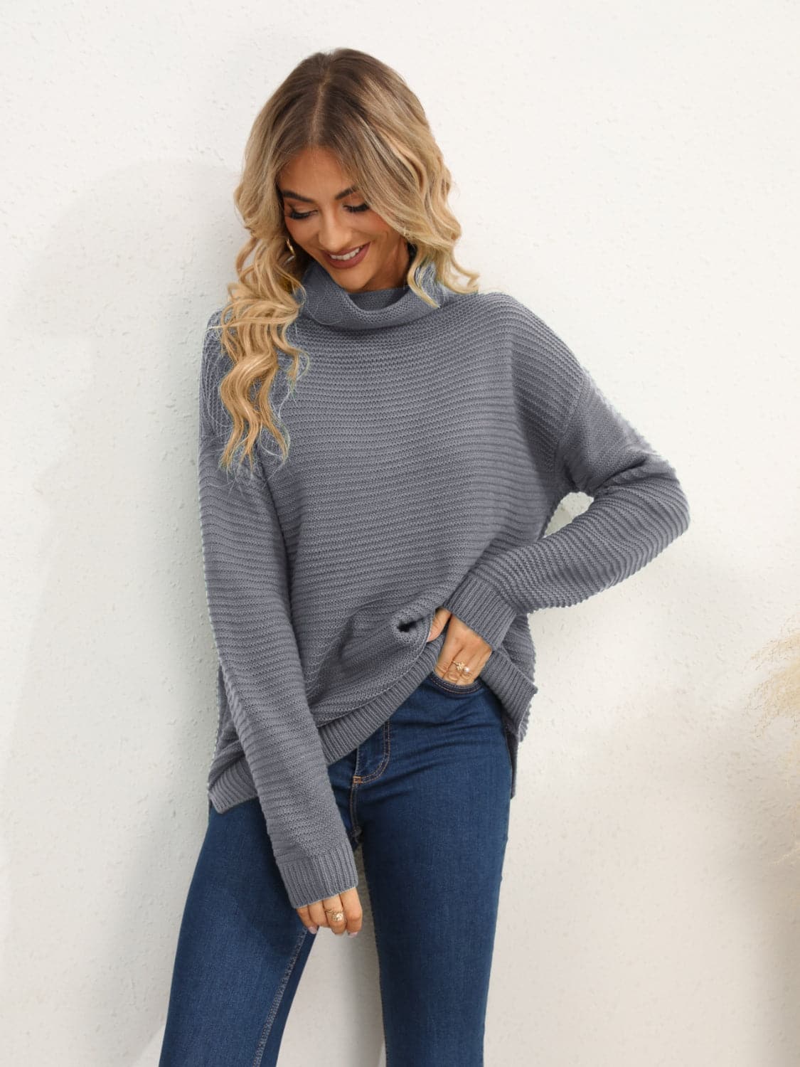 Slit Turtleneck Dropped Shoulder Sweater.