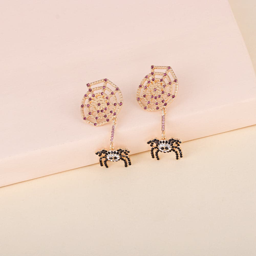 Sparkling alloy earrings with rhinestones