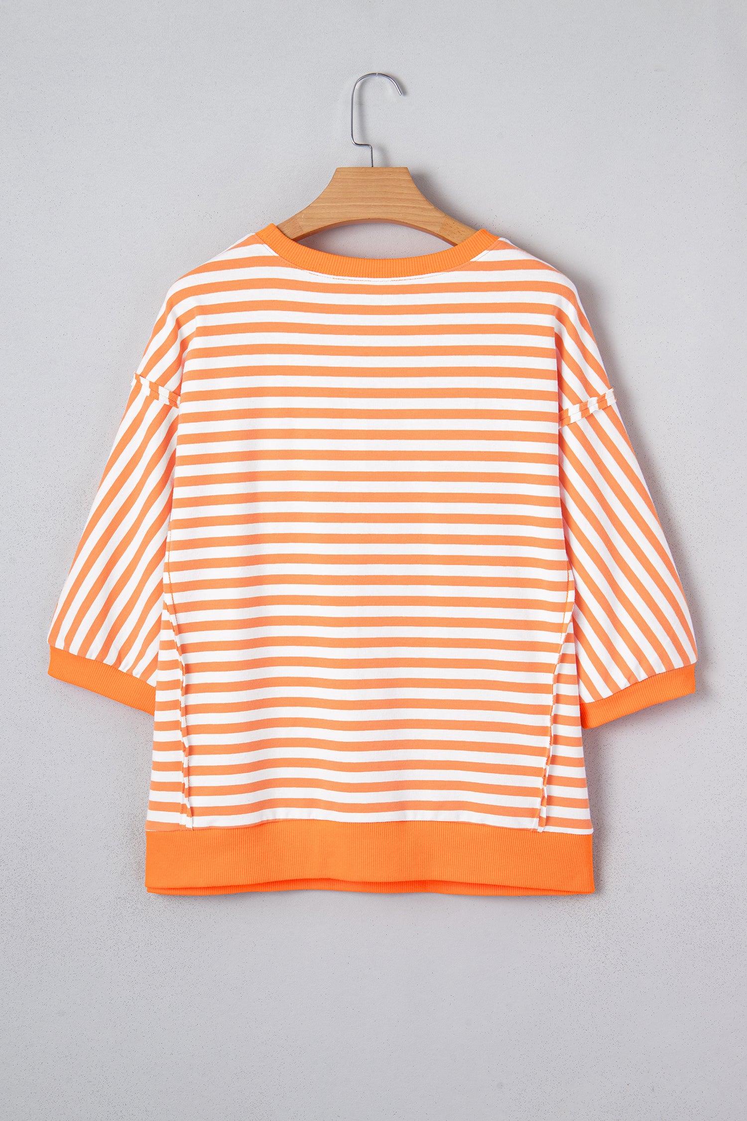Dear-Lover patchwork top front view showing orange striped color blocking and seam details