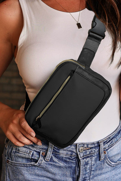 Sleek black crossbody bag with multiple zip compartments