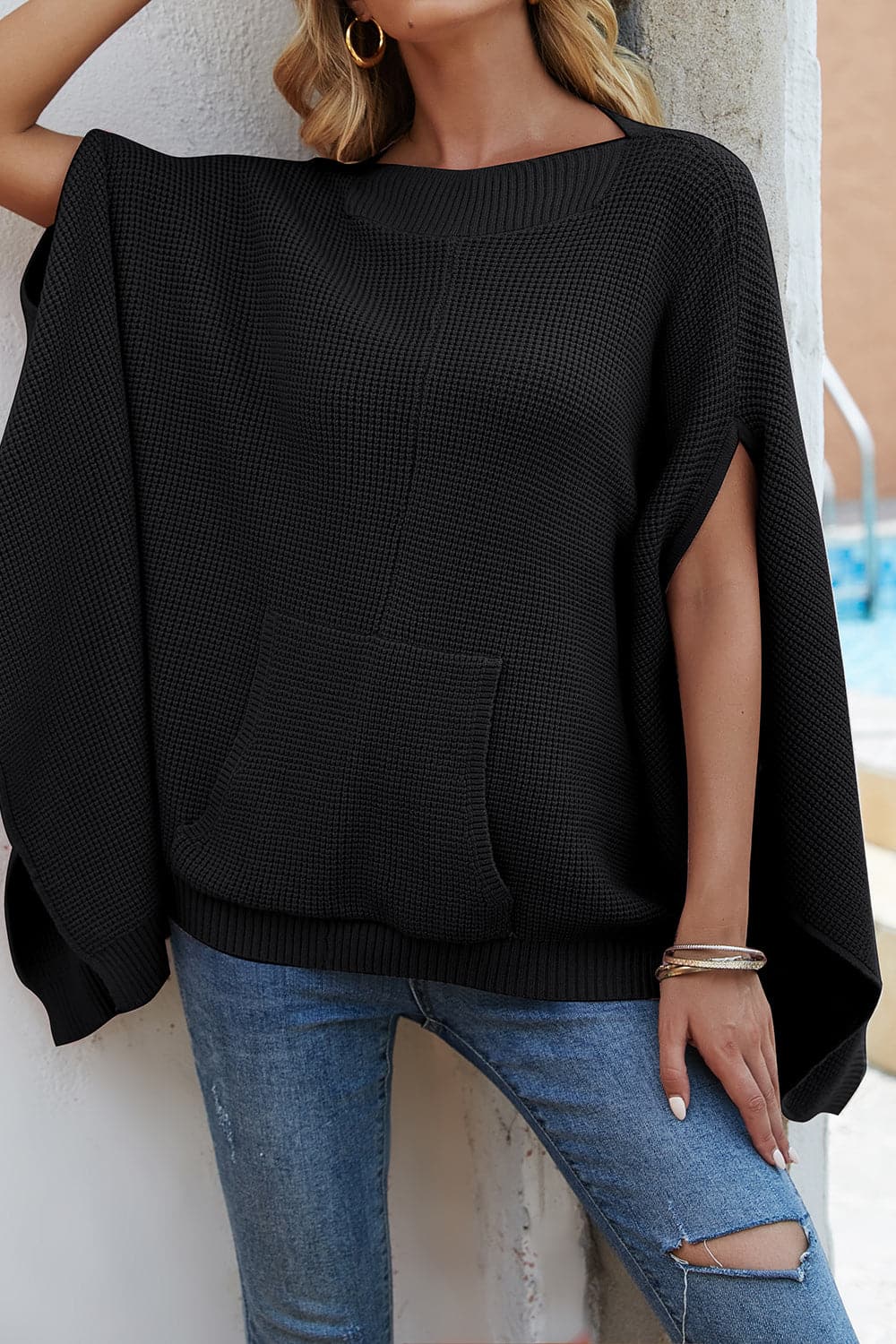 Waffle-Knit Pocketed Cape Sleeve Sweater.