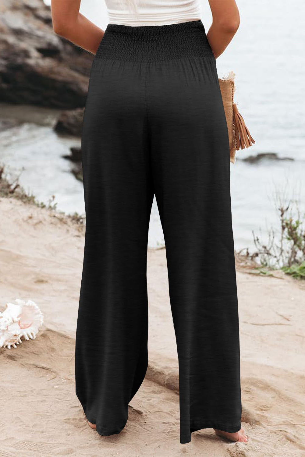 Chic black plus size wide leg pants with shirred high waist