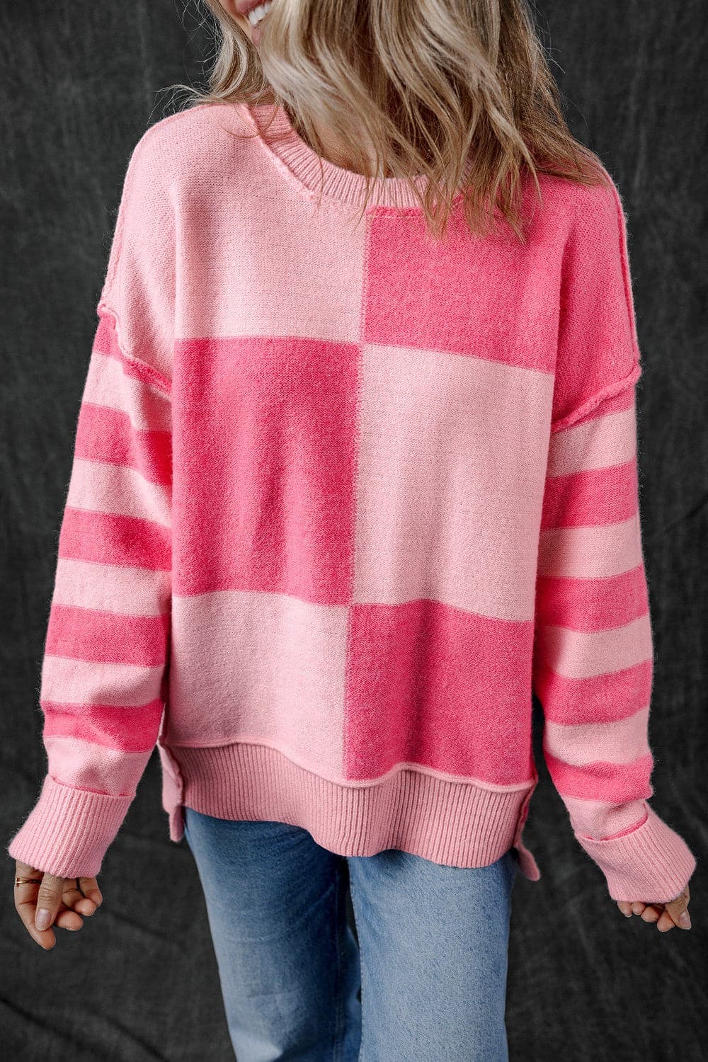 Exposed Seam Round Neck Sweater.