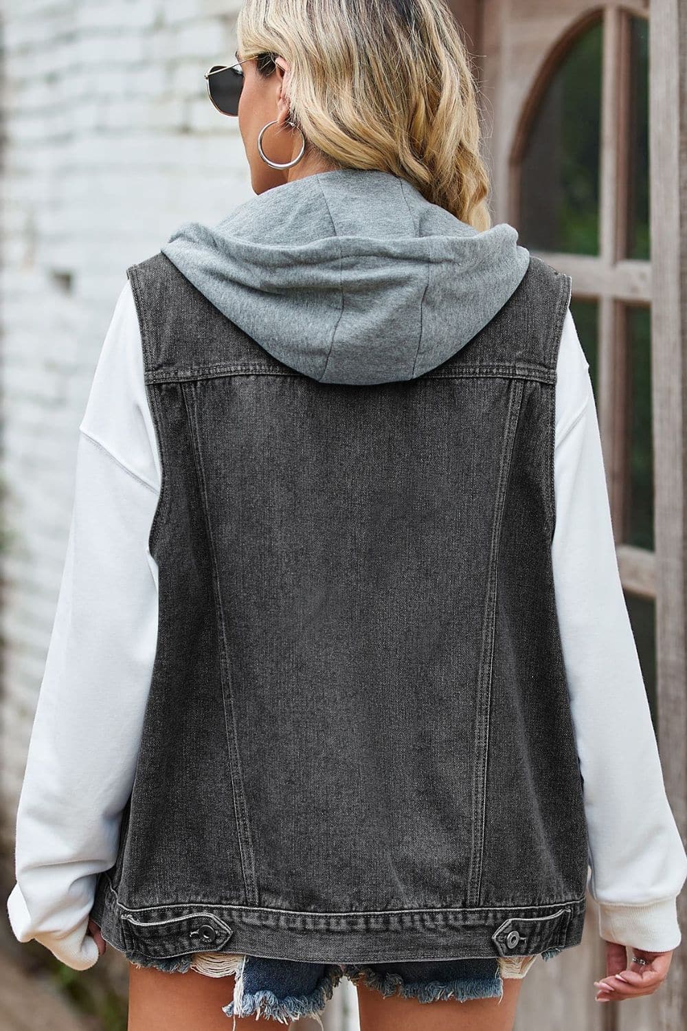 Sleeveless Denim Top with A Detachable Hood.