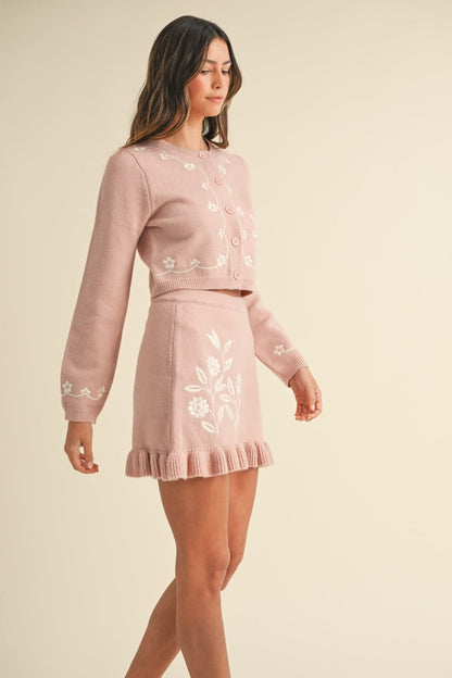 Charming floral embroidered cardigan and ruffled mini skirt ensemble