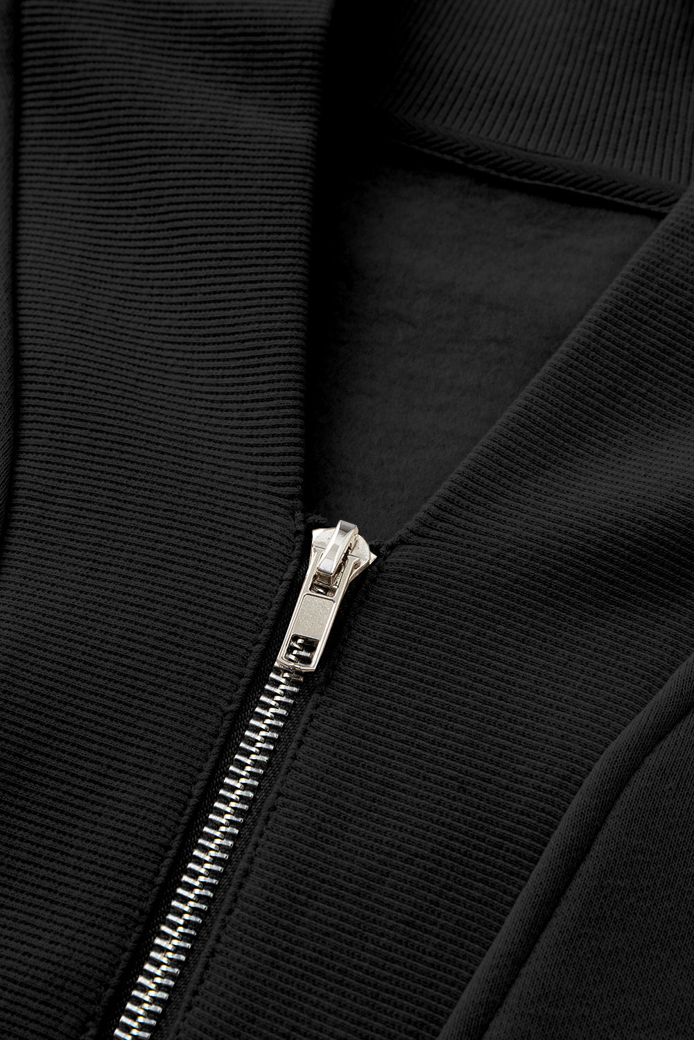 Chic black half zip tracksuit with ribbed edges for ultimate comfort