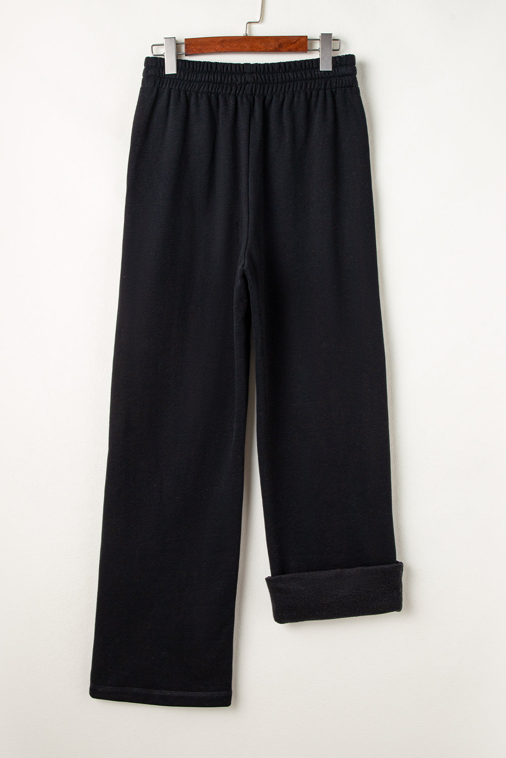 Cozy black fleece-lined casual pants with adjustable drawstring waist