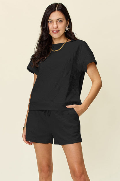 Double Take Full Size Texture Short Sleeve T-Shirt and Drawstring ShorFeatures: Drawstring
Number of pieces: Two-piece
Stretch: Slightly stretchy
Material composition: 97% polyester, 3% spandex
Care instructions: Machine wash cold. TumLove Salve Full Size Texture Short SleeveTwo-Piece Sets