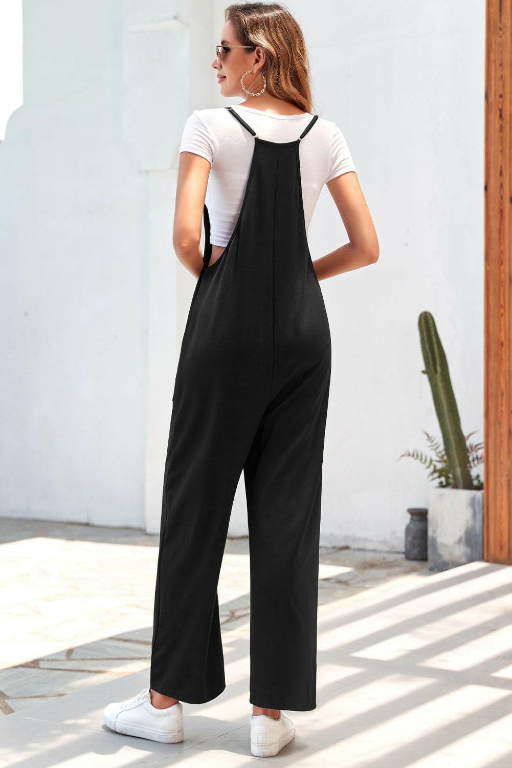 Pocketed Spaghetti Strap Wide Leg Jumpsuit.