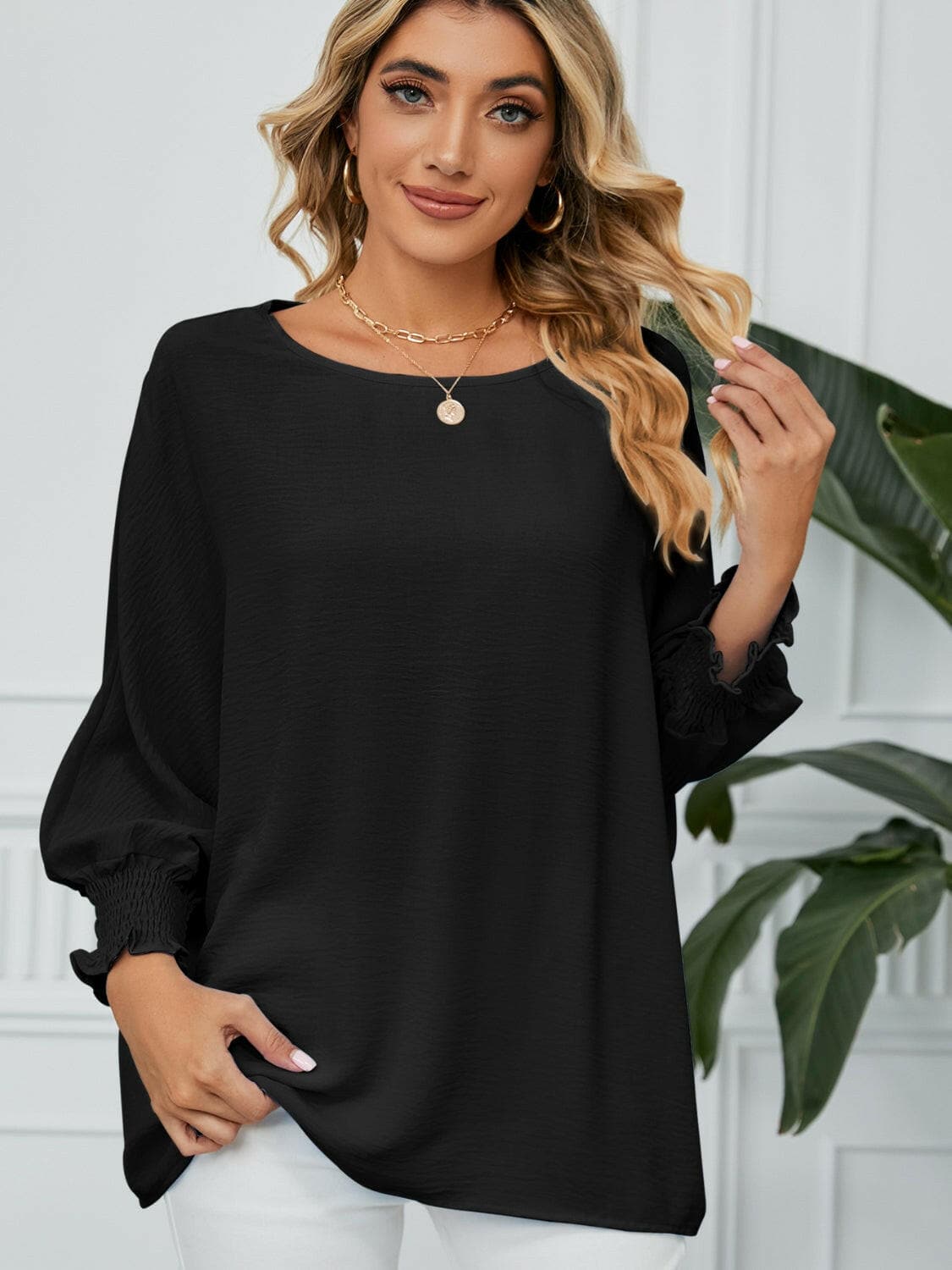 Smocked Lantern Sleeve Round Neck Blouse.