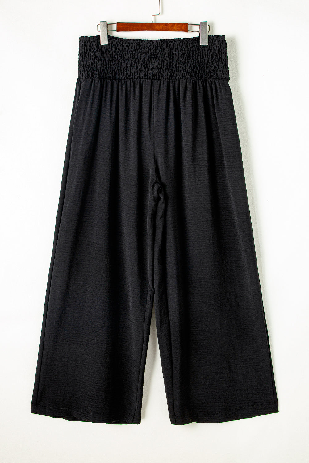 Chic black plus size wide leg pants with shirred high waist