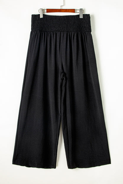 Chic black plus size wide leg pants with shirred high waist