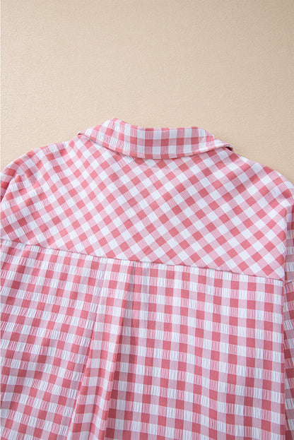 Chic pink gingham collared shirt with functional chest pockets