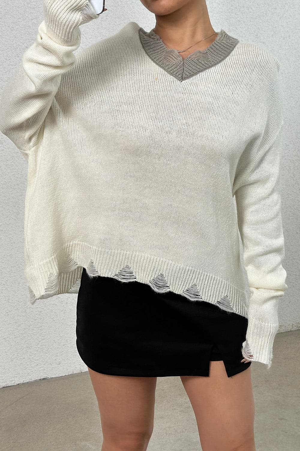 Distressed V-Neck Dropped Shoulder Sweater.