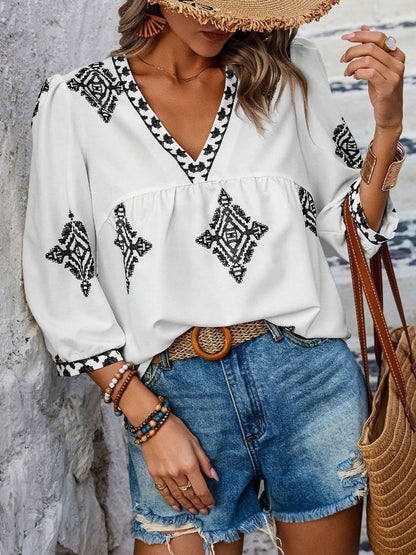 Printed V-Neck Three-Quarter Sleeve Blouse.