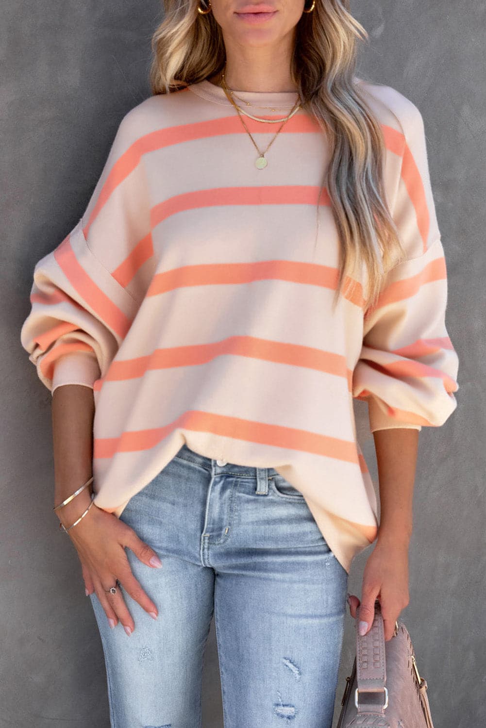 Striped Round Neck Dropped Shoulder Sweatshirt.