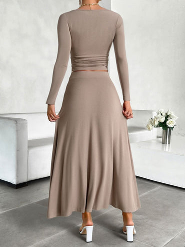 Chic and Stretchy Round Neck Top and Skirt Ensemble