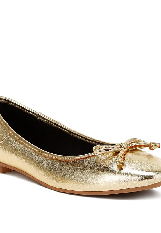 Metallic bow detail flats