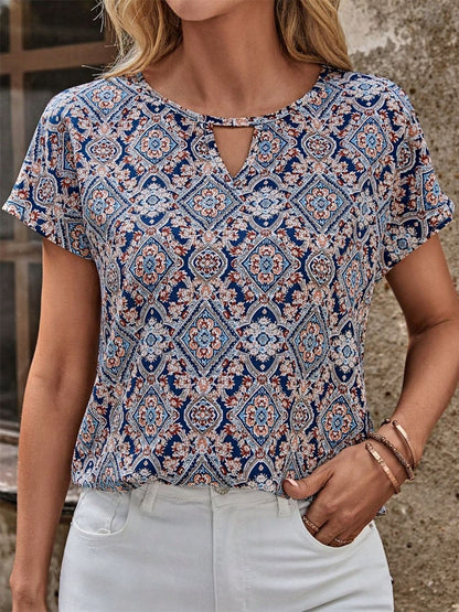 Cutout Printed Round Neck Short Sleeve Blouse.