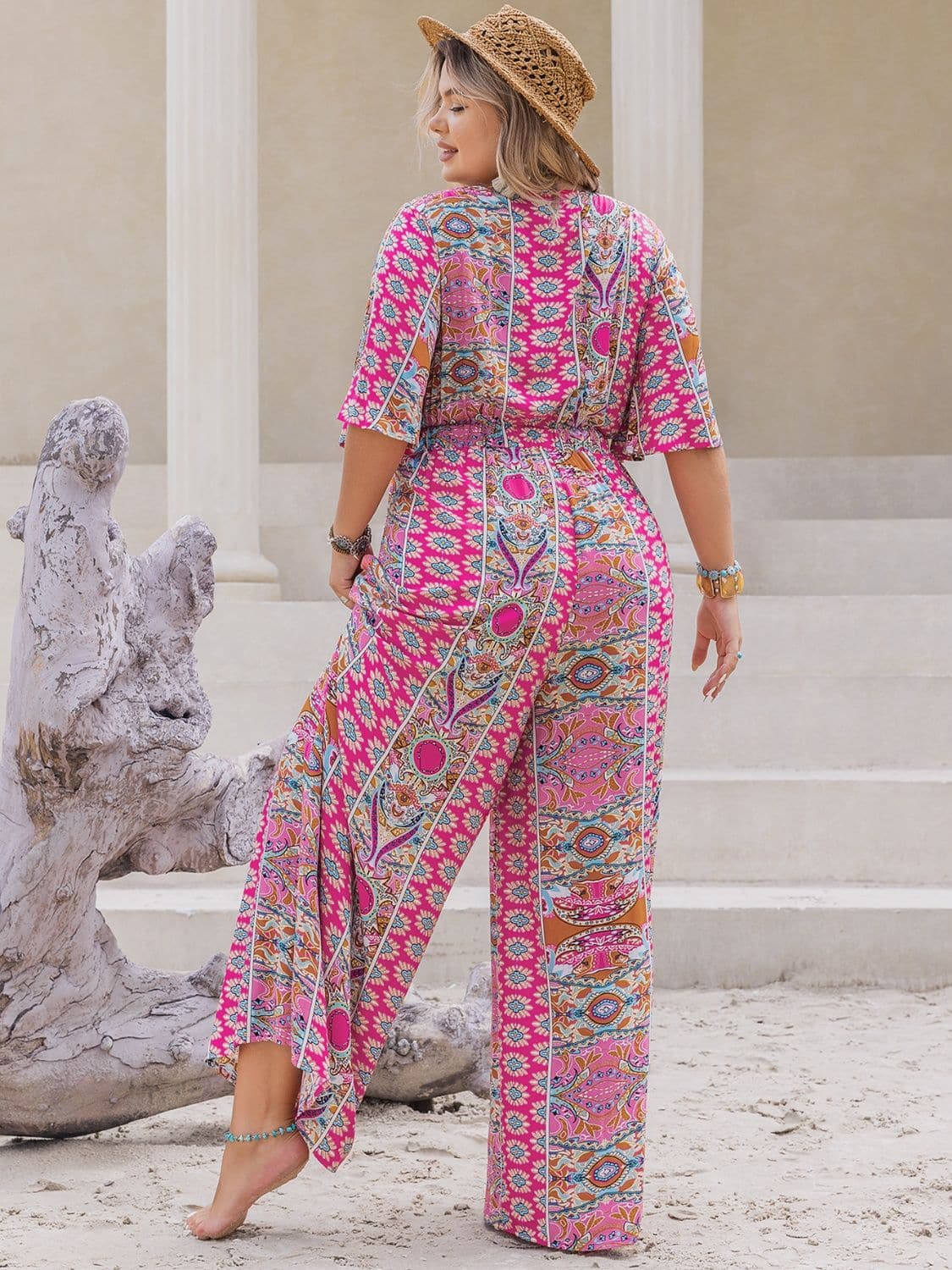 Plus Size Printed Half Sleeve Wide Leg Jumpsuit.