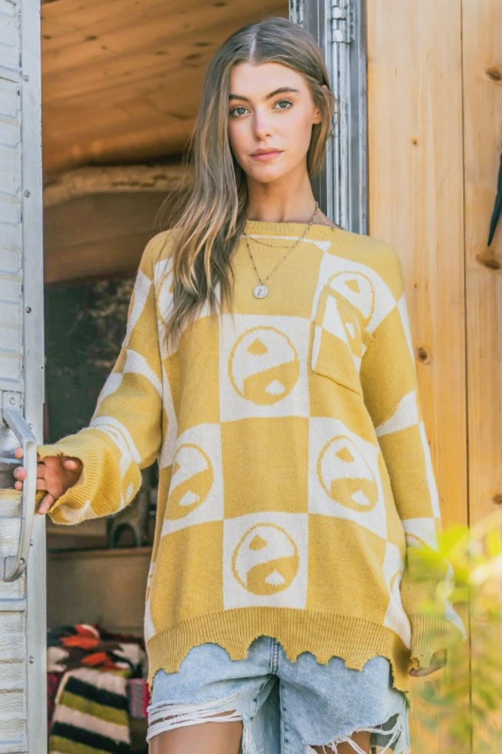 Yin Yang checkerboard pullover sweater with relaxed fit