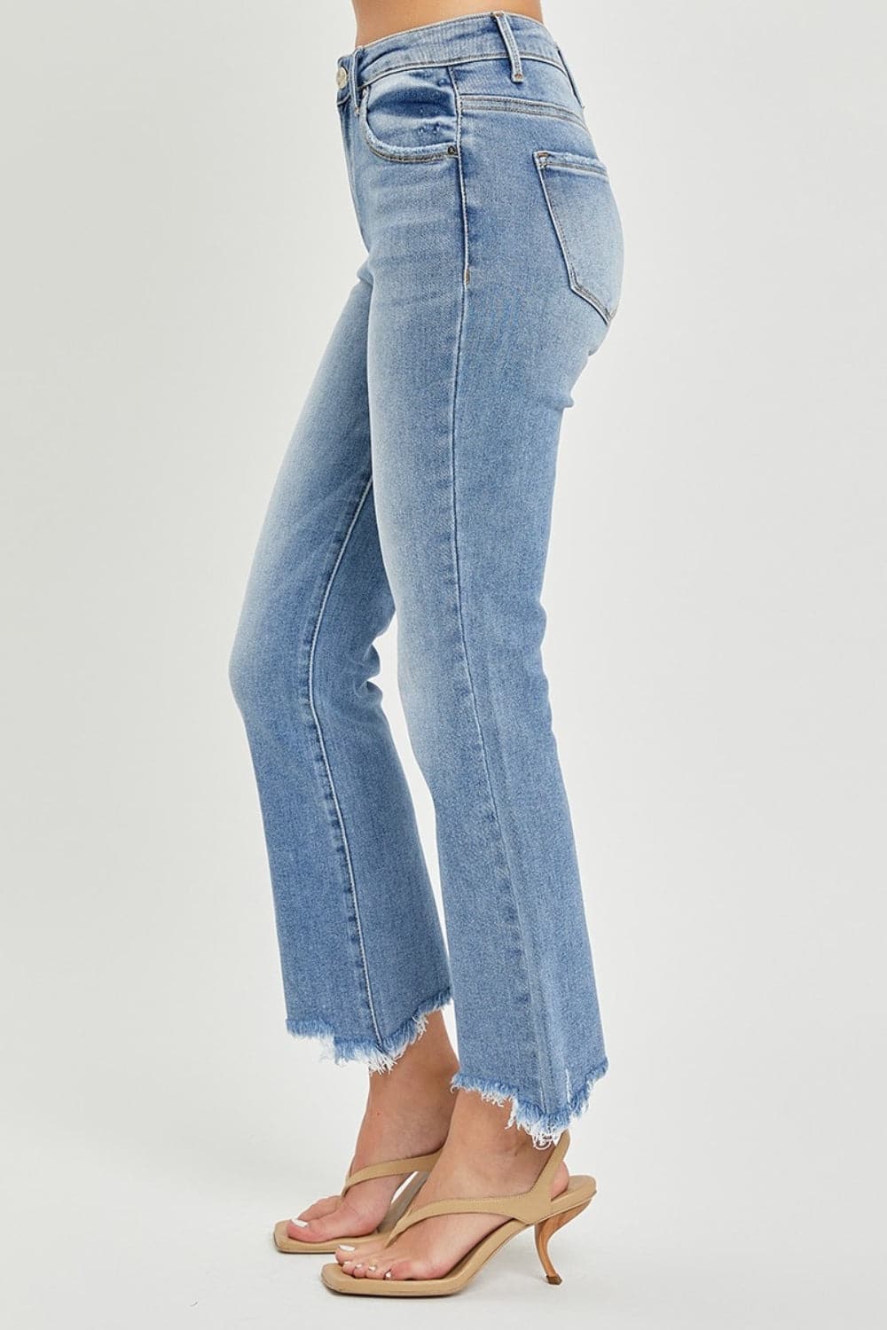 RISEN Full Size Frayed Hem Cropped Straight JeansTrendy and Stylish Design

Frayed hem cropped straight jeans are a trendy and stylish choice for a casual and chic look. The frayed hem adds a touch of edginess and Love Salve RISEN Full Size Frayed Hem Cropped Straight JeansJeans