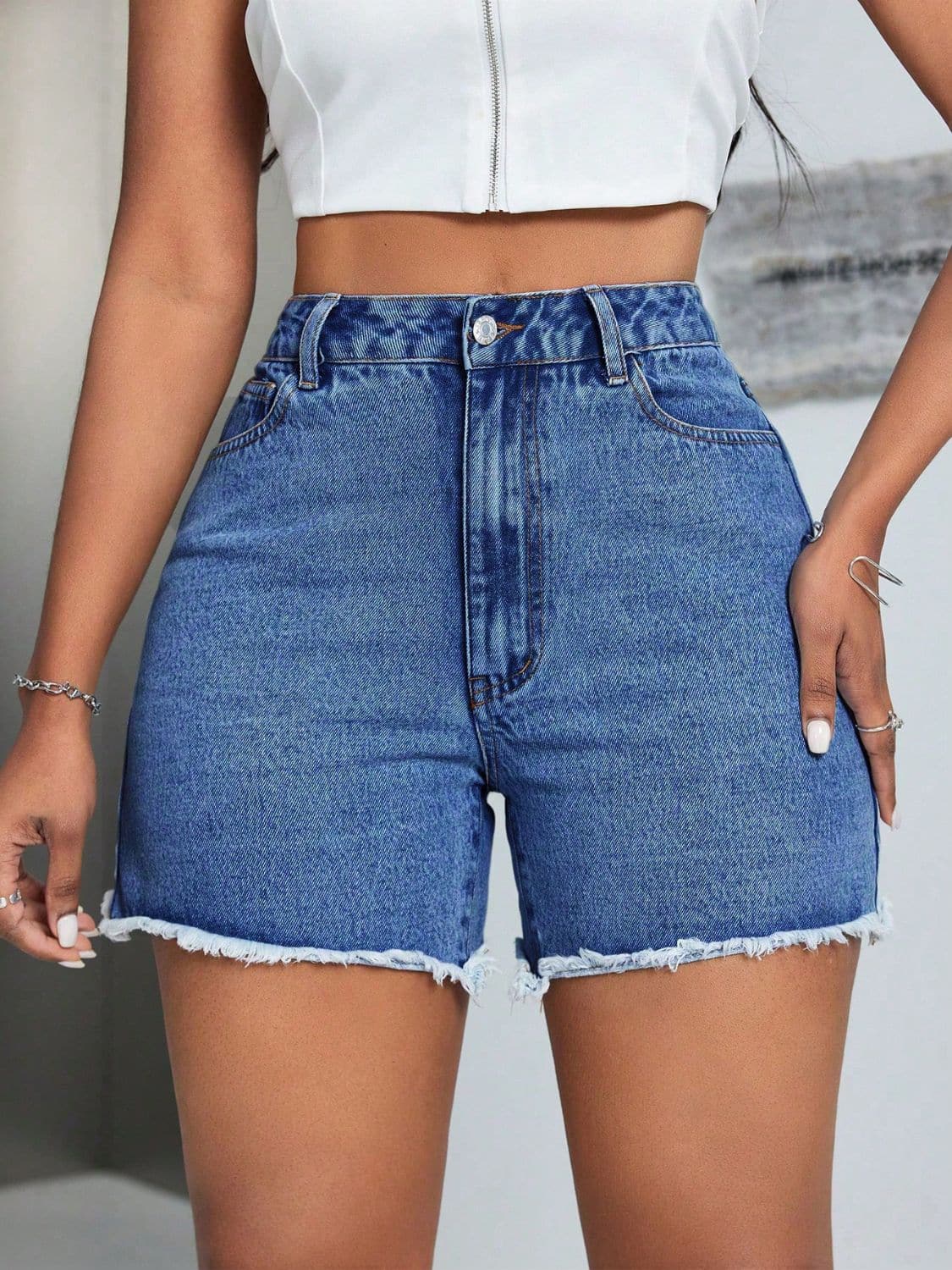 Raw Hem High Waist Denim Shorts.