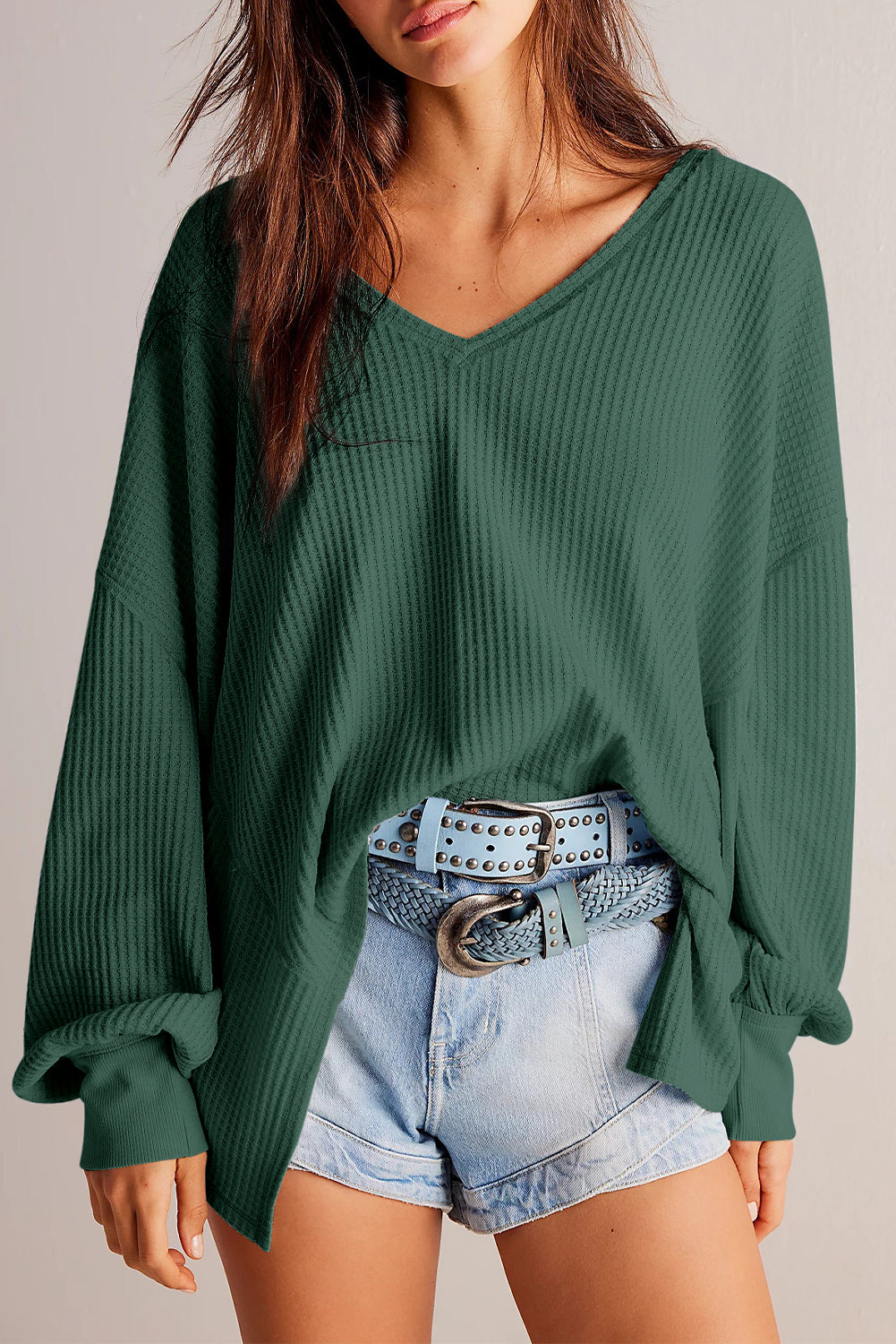 Chic blackish green waffle knit V-neck long sleeve blouse with drop shoulders