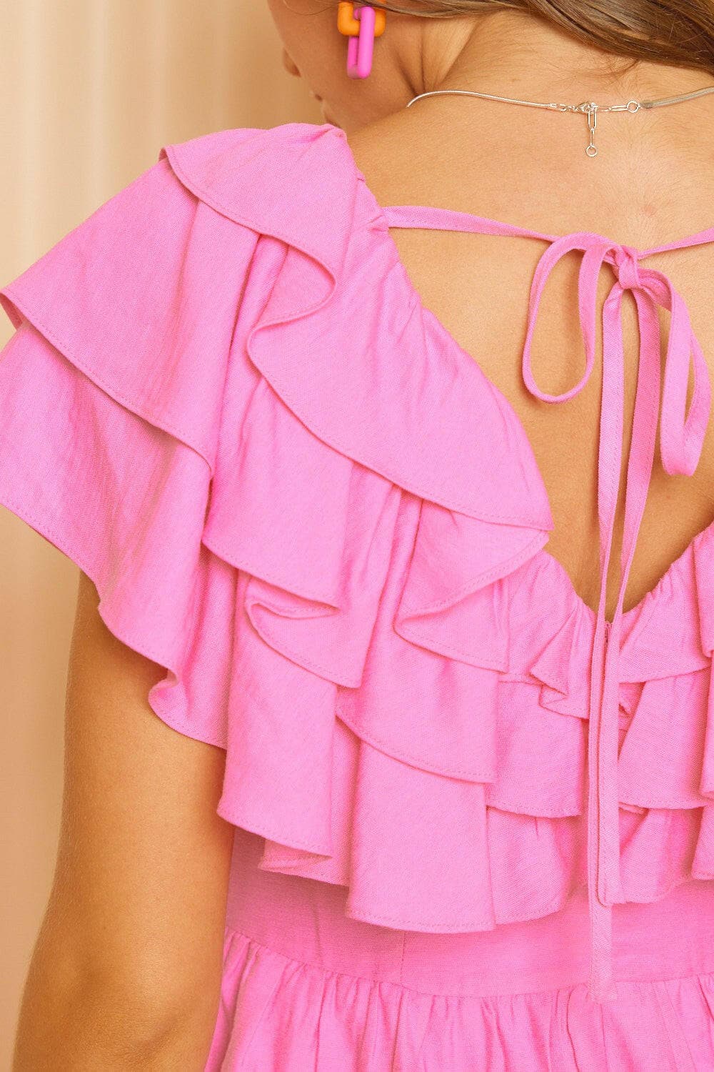 Idem Ditto Ruffled Layered Tie Back Romper.