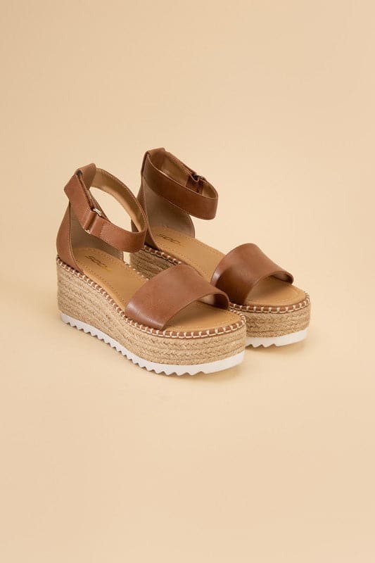 TUCKIN-S Platform Sandals.