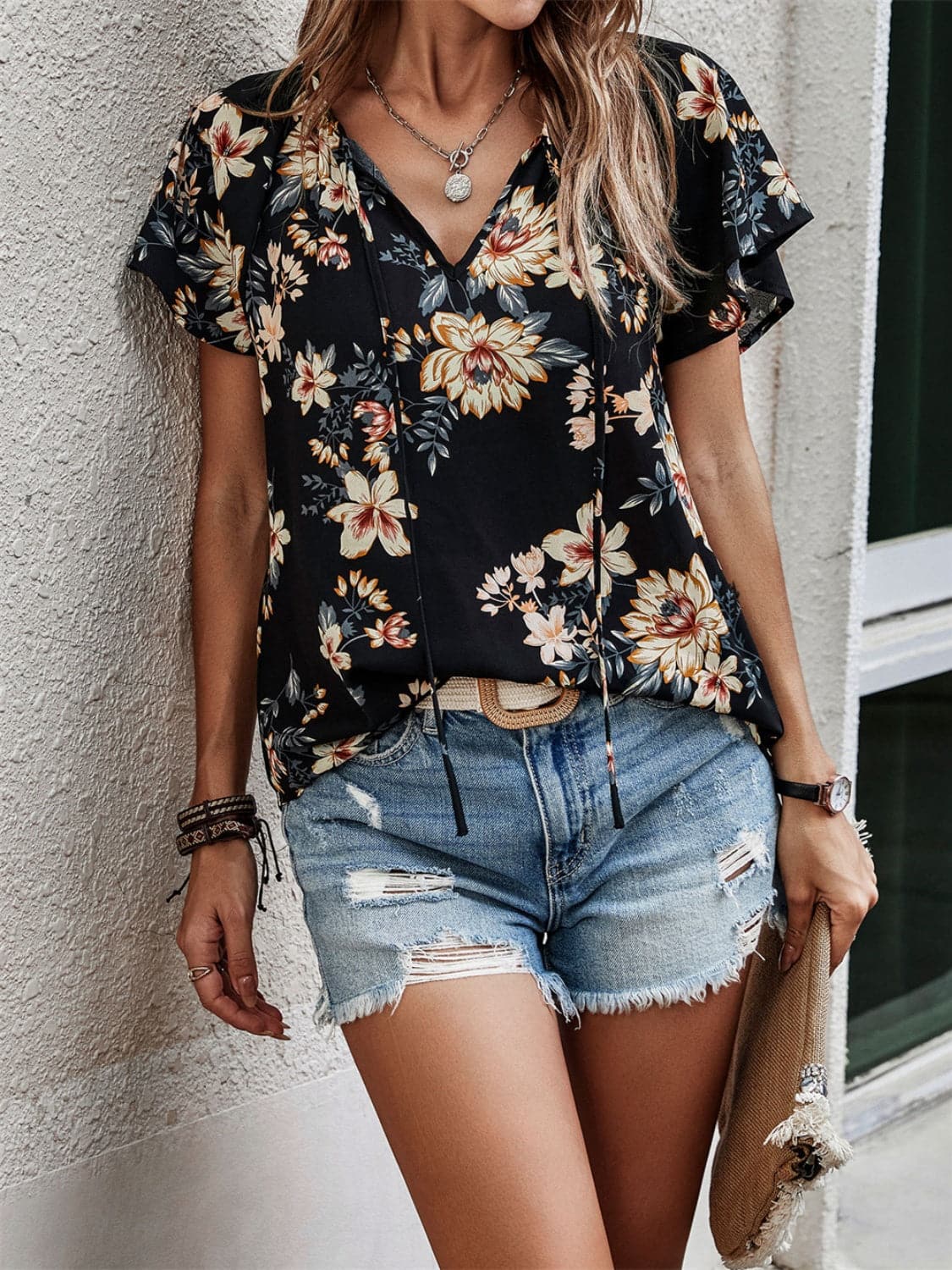 Printed Tie Neck Short Sleeve Blouse.