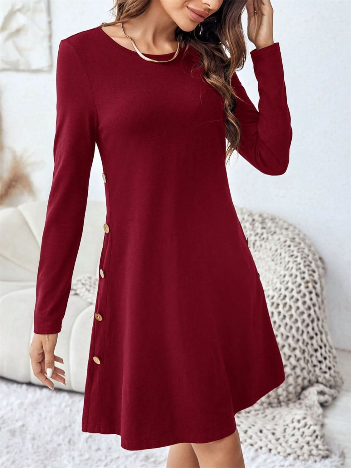 Chic mini dress with pockets and decorative buttons