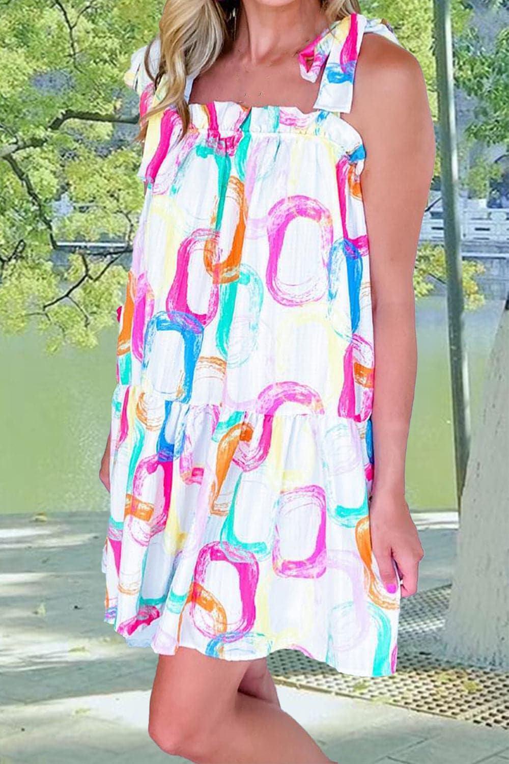 Tied Printed Sleeveless Mini Dress.