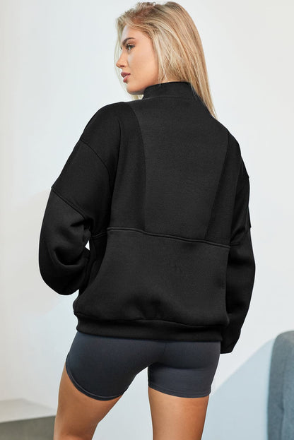 Half Zip Dropped Shoulder Sweatshirt.