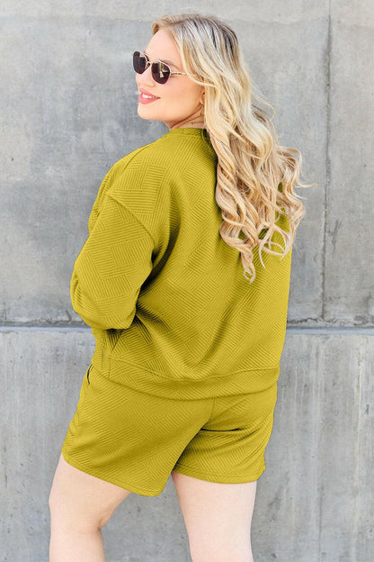 Double Take Full Size Texture Long Sleeve Top and Drawstring Shorts SeElevate Your Loungewear with Our Double Take Set
 Step into comfort and style with the Double Take Full Size Texture Long Sleeve Top and Drawstring Shorts Set. This Love Salve Full Size Texture Long Sleeve Topusa