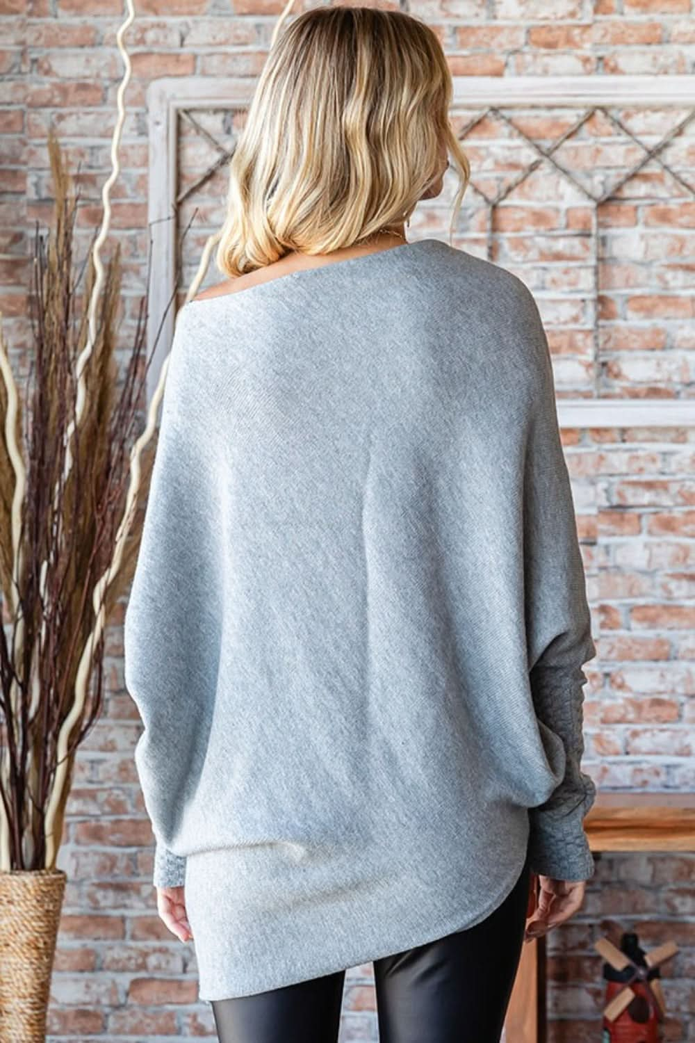 Asymmetrical hem dolman sweater