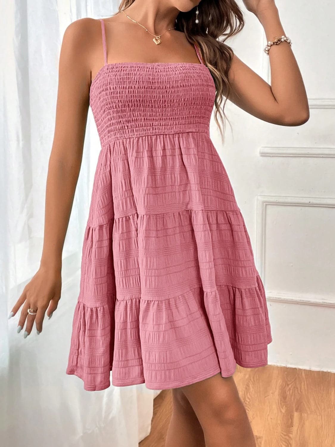 Smocked Tiered Sleeveless Mini Dress.