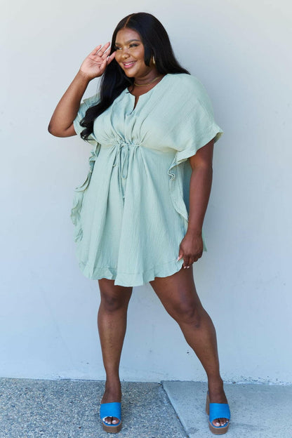 Ninexis Out Of Time Full Size Ruffle Hem Dress with Drawstring WaistbaExperience Effortless Elegance with the Ninexis Out Of Time Full Size Ruffle Hem Dress in Light Sage. This stunning dress is crafted from 100% cotton, providing a soLove Salve Time Full Size Ruffle Hem DressTIKTOK