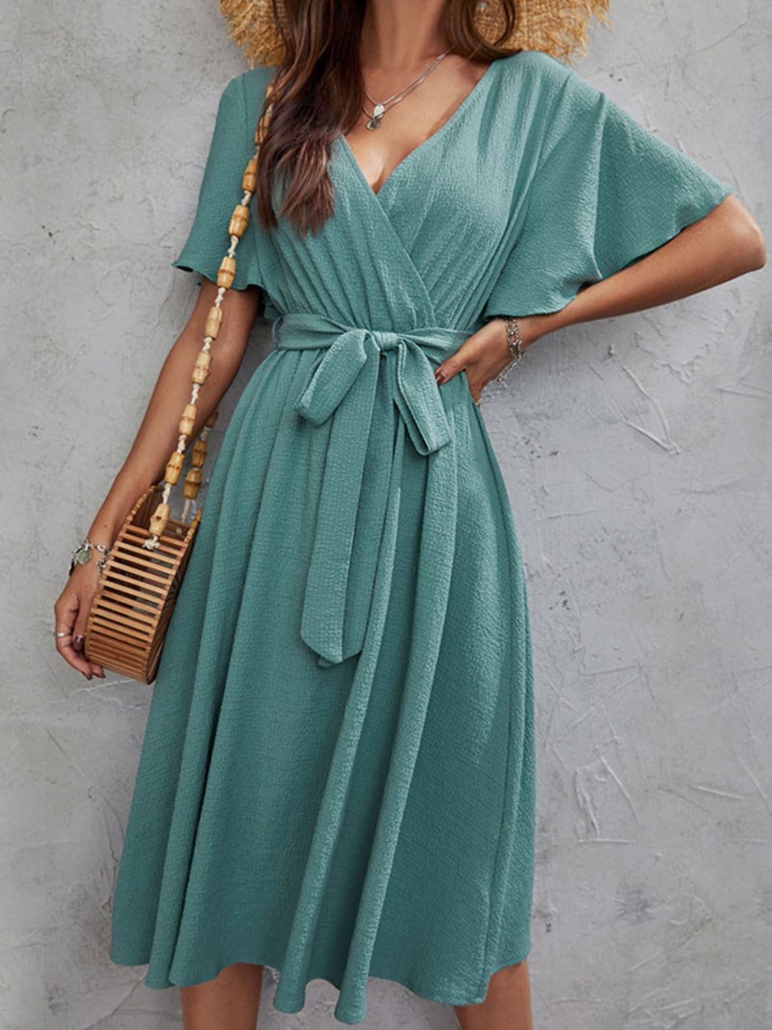 Surplice Flutter Sleeve Midi Dress.