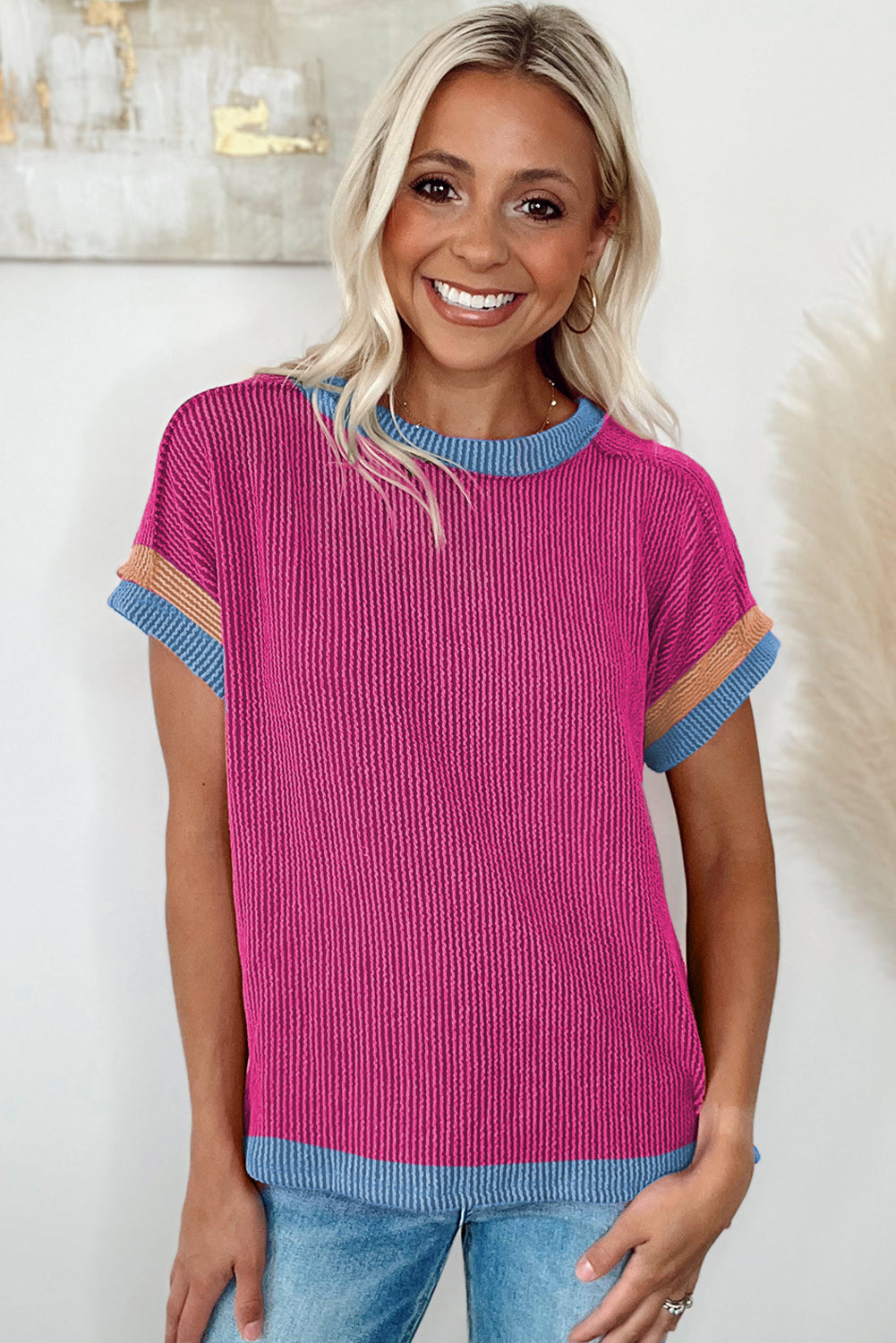 Vibrant pink textured t-shirt with stylish contrast trim