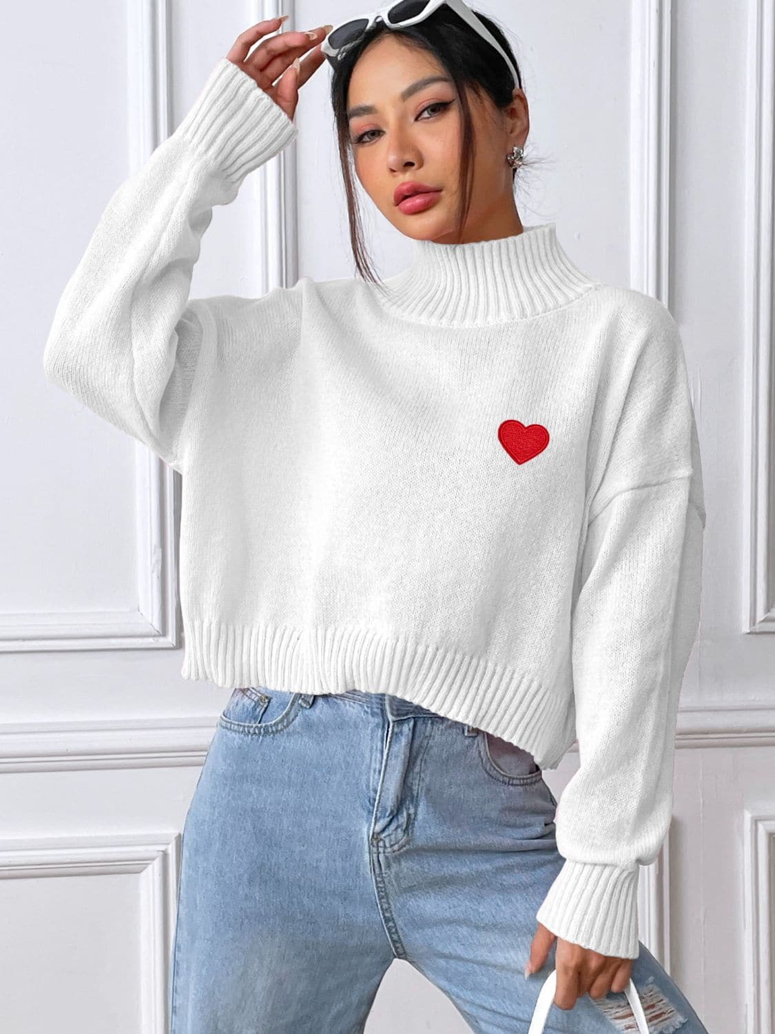 Charming heart turtleneck sweater for cozy elegance