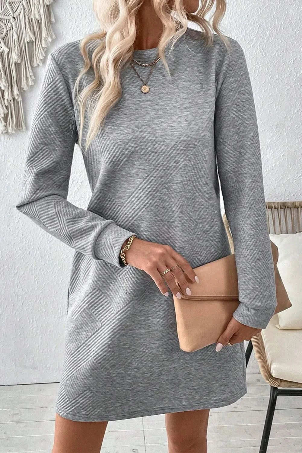 Textured long sleeve mini dress with round neck