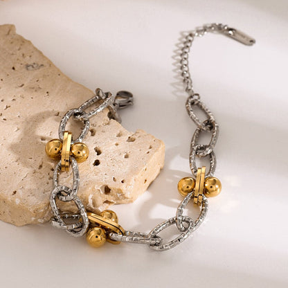 Elegant stainless steel and gold-plated chain bracelet