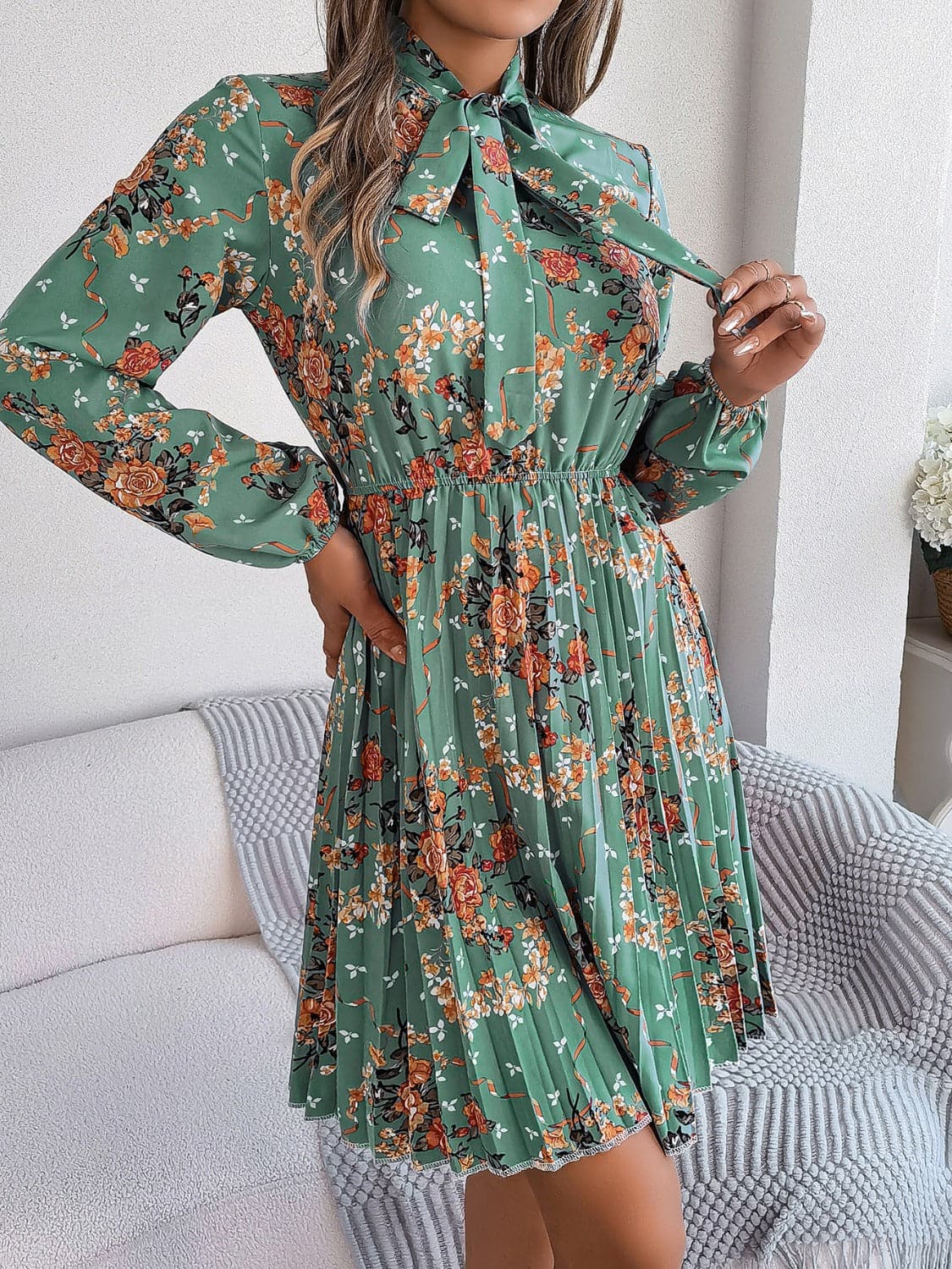 Pleated Printed Tie Neck Long Sleeve Dress.